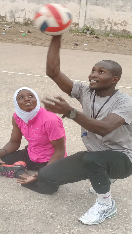 Coach GBETO Judicael Claver Elyon with an athlete in Benin.